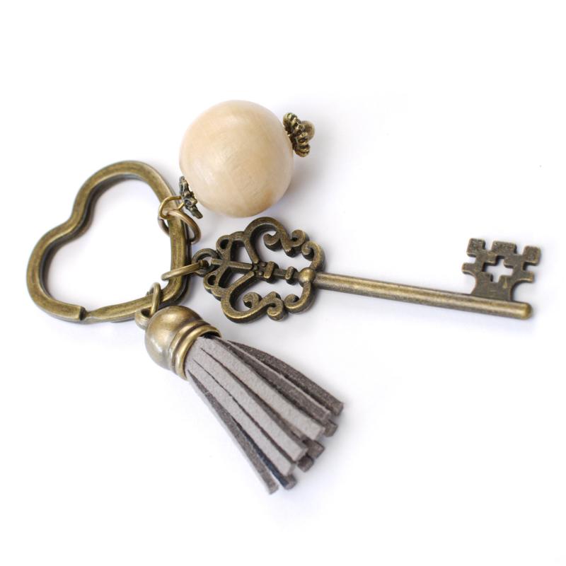 Vintage Schlüsselanhänger mit Holzperle, bronze